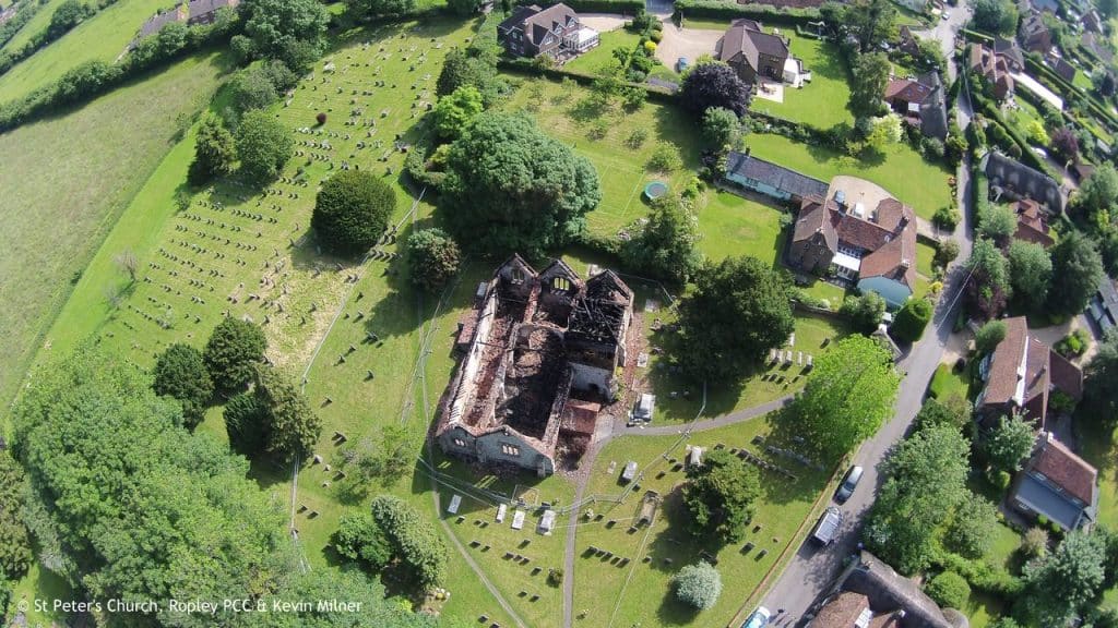 Wide angle drone image of the destruction at St Peter's Church, Ropley
